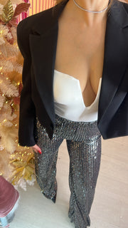 Pantalone a zampa con paillettes